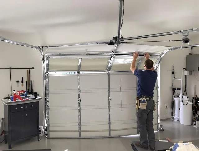 Hinesville Garage Door Repair specialist performing precise section replacement on Hinesville garage door