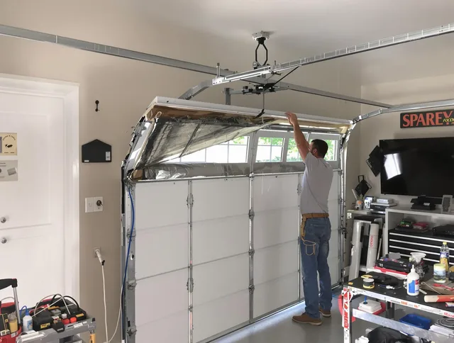 Garage door section replacement by Hinesville Garage Door Repair in Hinesville