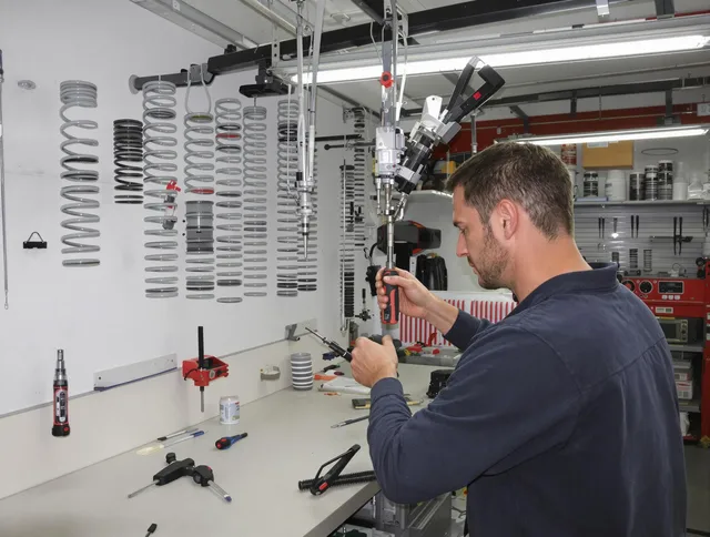 Hinesville Garage Door Repair safety certified technician performing precision spring replacement in Hinesville