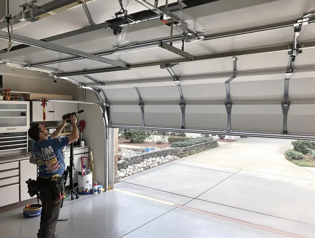 Garage door track repair service by Hinesville Garage Door Repair in Hinesville